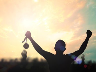 person holding a medal